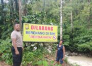 Polsek Lebong Utara Pasang Spanduk Himbauan di Sungai Tik Maceak, Cegah Kejadian Serupa Terulang.